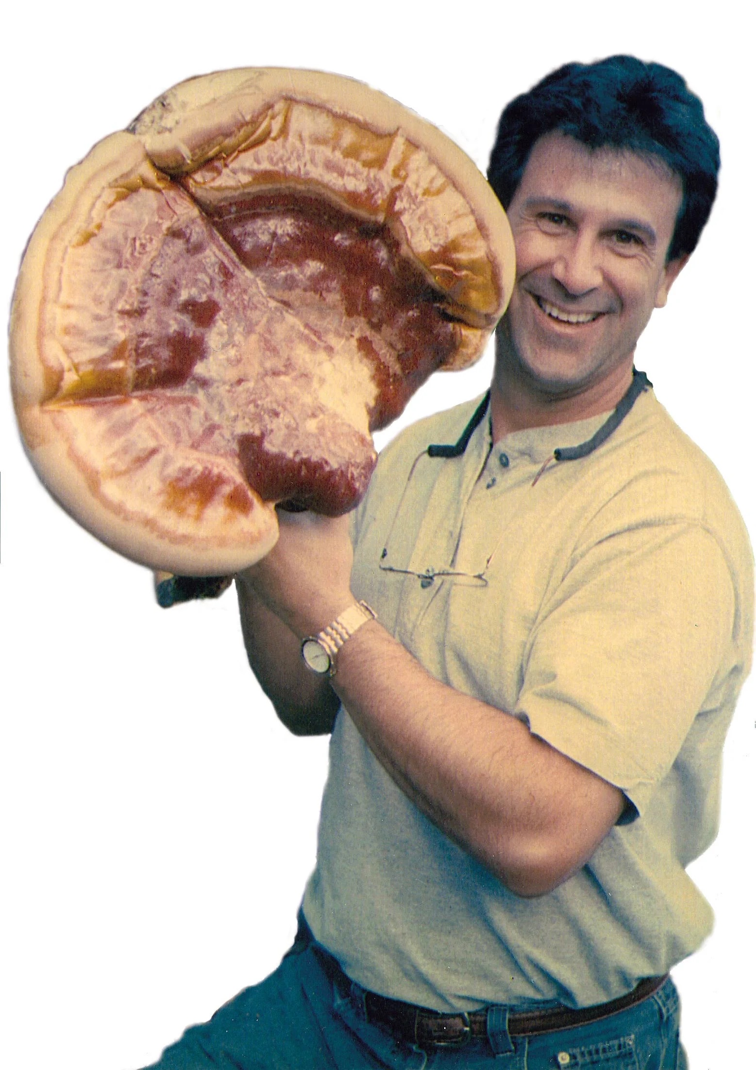 Dr. Mike Amaranthus holding a large mushroom
